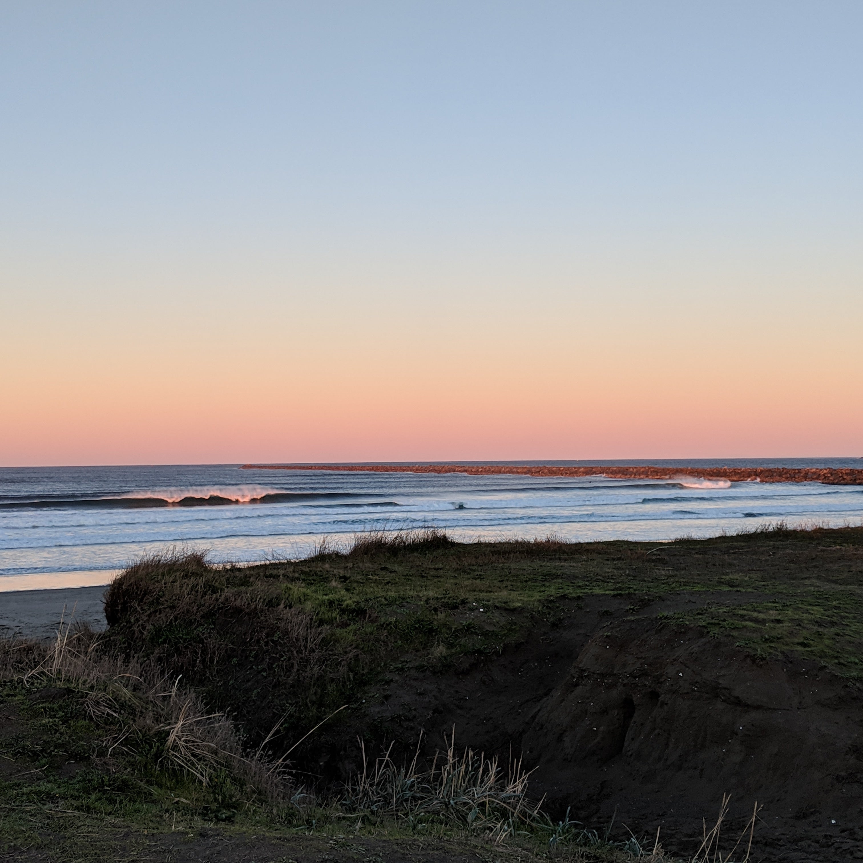 Westport Light State Park Jetty and Waves at Sunset looking west